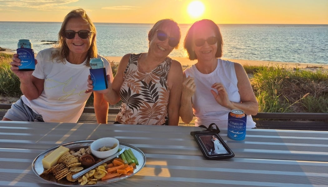 Enjoying a plate of snacks with a small group of women