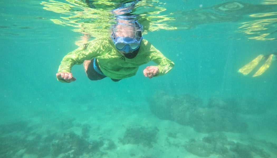 A woman snorkelling