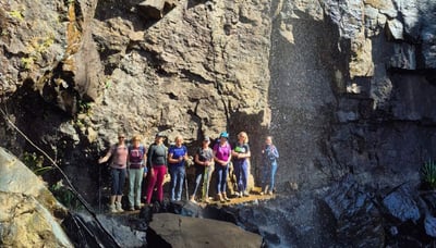 Big smiles at the water waterfall!