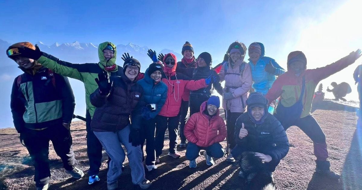 Group shot on Pikey Peak summit Nepal