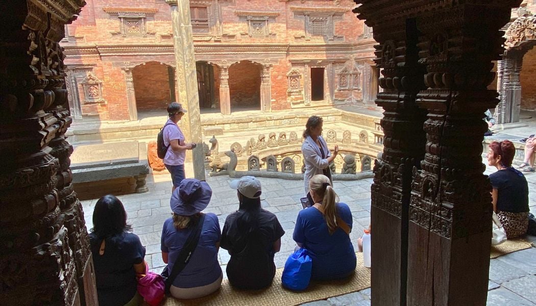 Group sitting in ancient temple Kathmandu-1