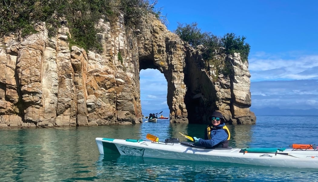 Kayak between sandstone rocks