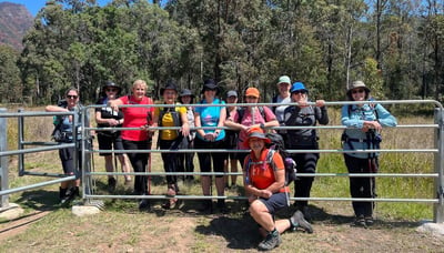 Ladies Trekking group posing at gate