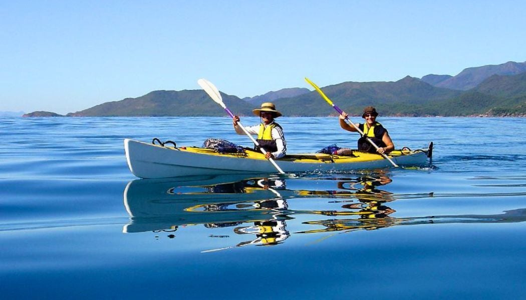 Paddle through clear waters around Hinchinbrook