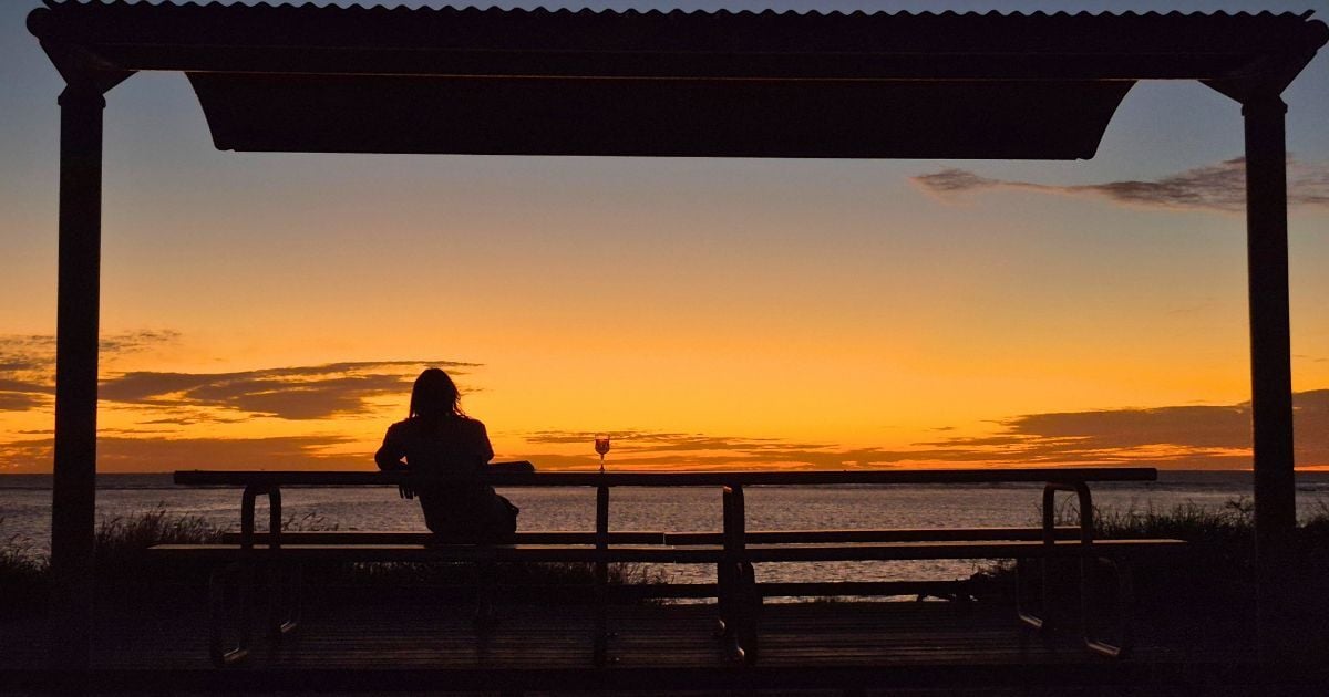 Watching sunset with a glass of wine