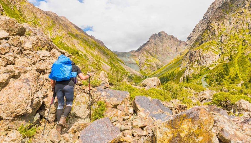 Woman hiking in a rocky landscape