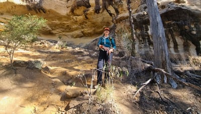 Woman smiling during a hike