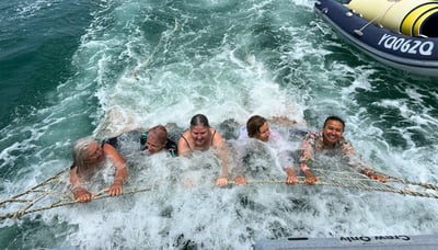 Women enjoying a boom net ride