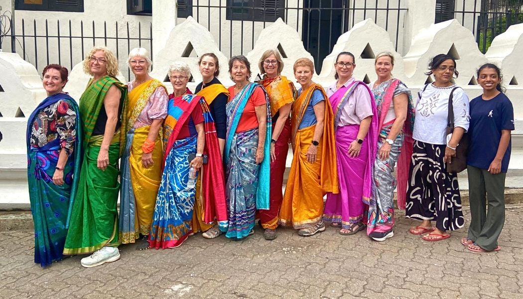 Womens tour group dressed in traditional Sri Lankan clothing