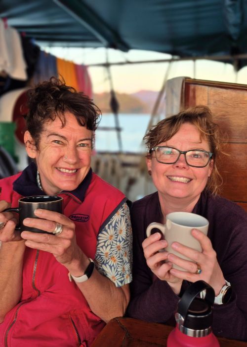 Two ladies sharing a coffee on a boat